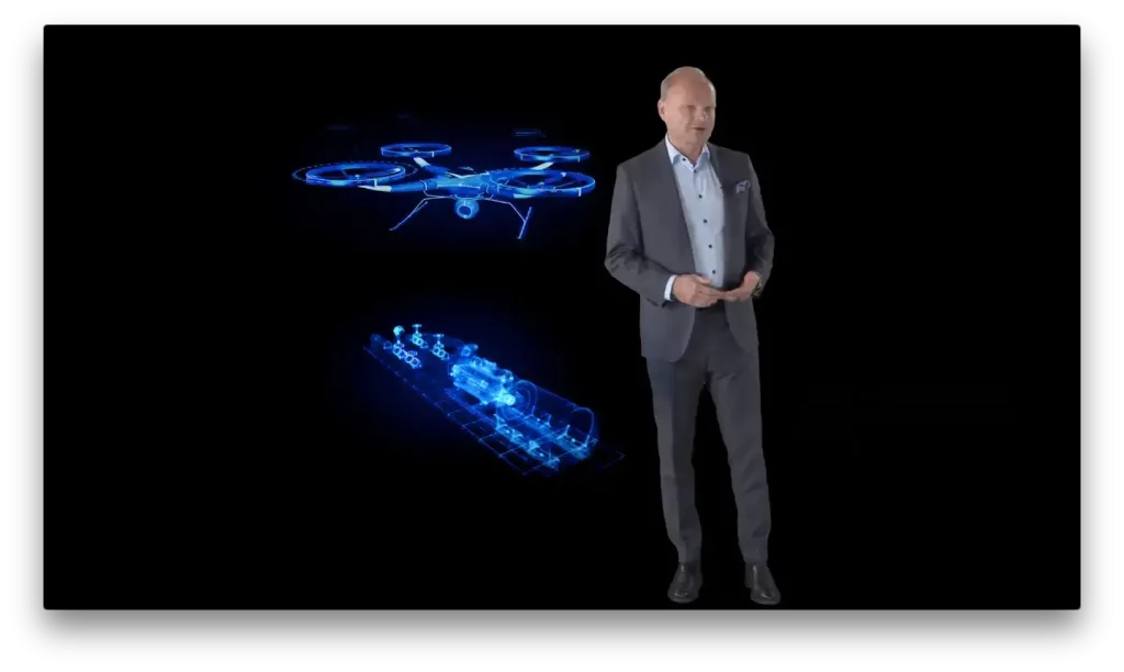 A person presenting a drone hologram